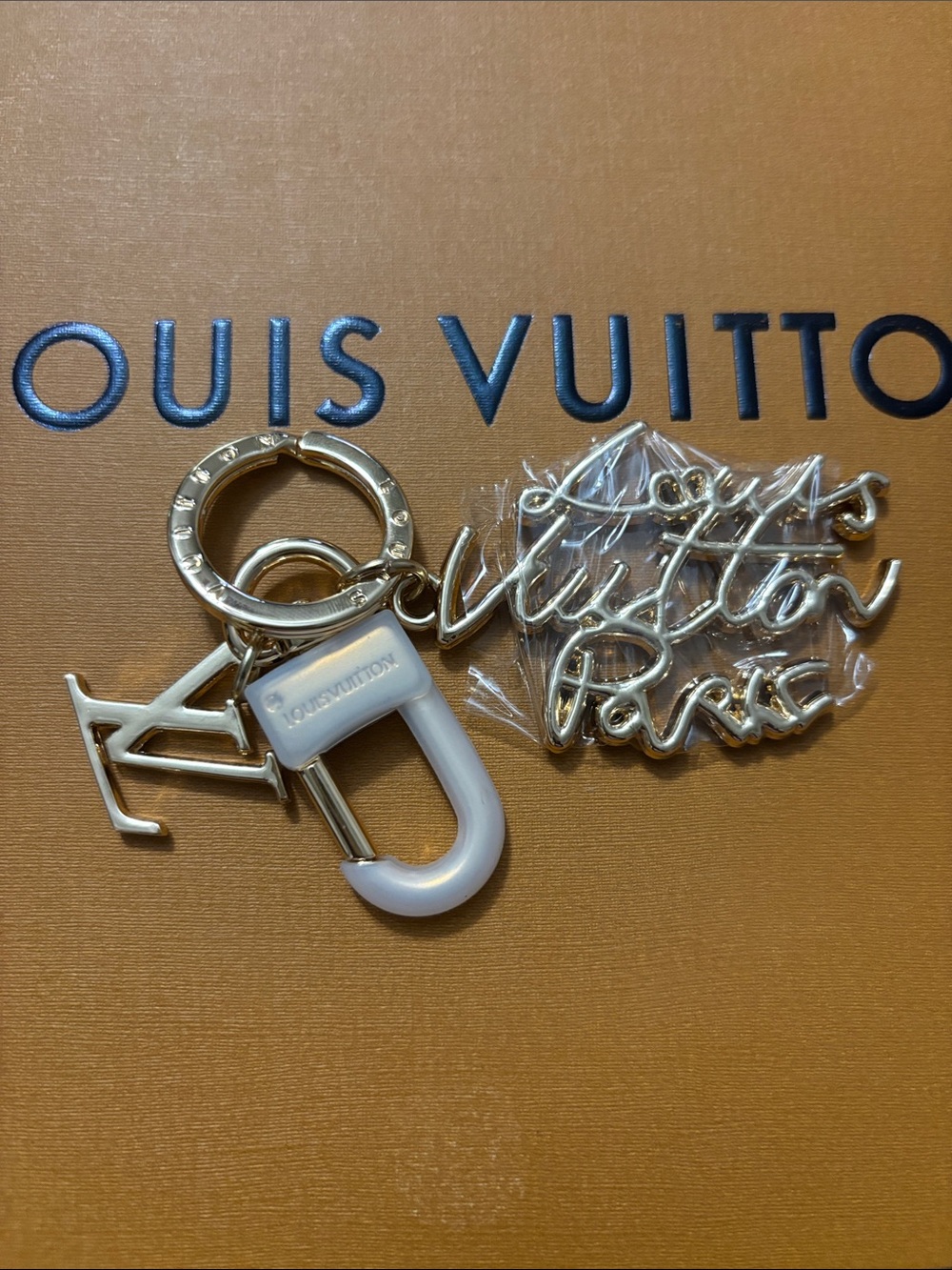 “Louis Vuitton Paris” Gold-Tone Script Keychain/Charm